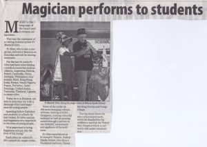 Magician performs to students